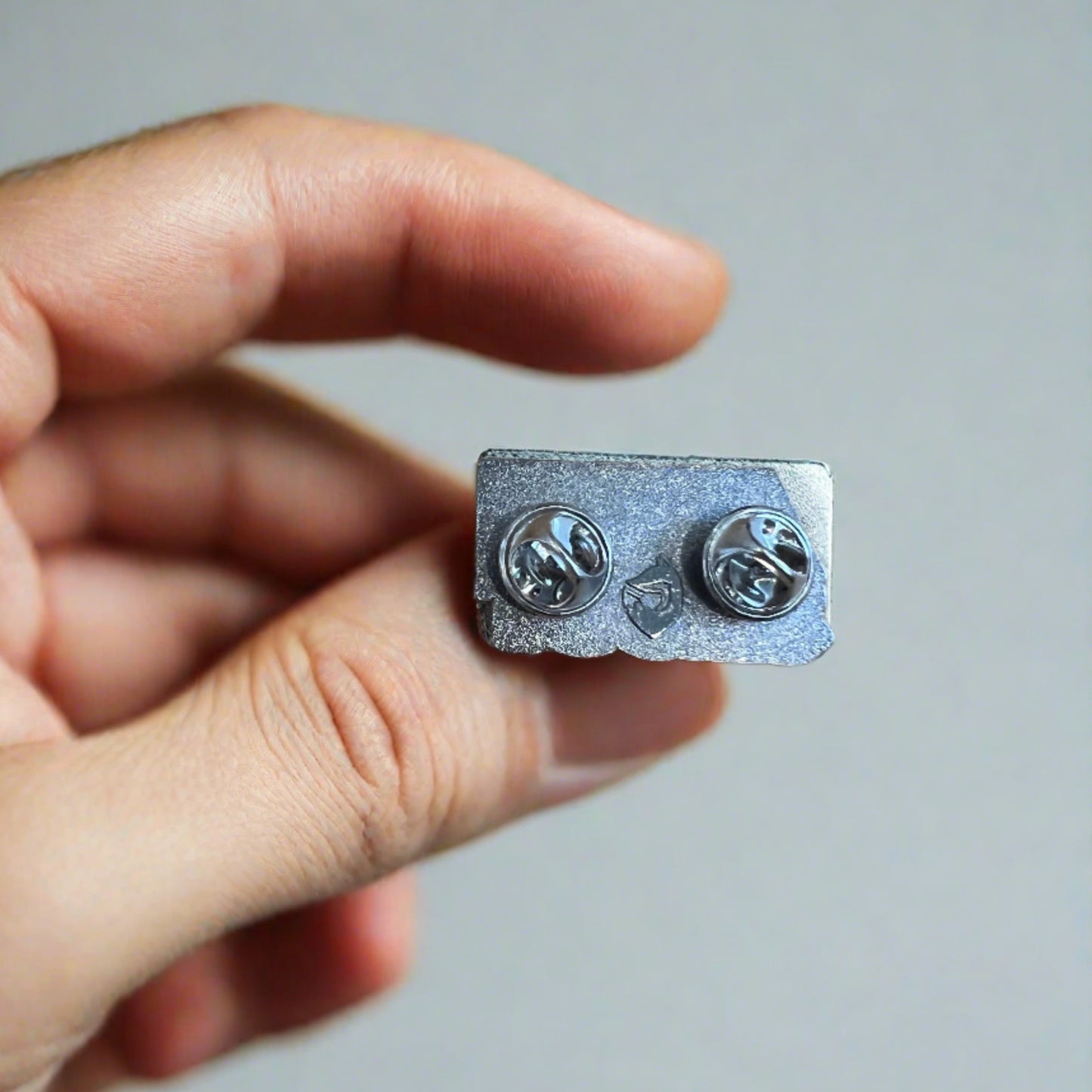 Anti Shoot Pin Badge