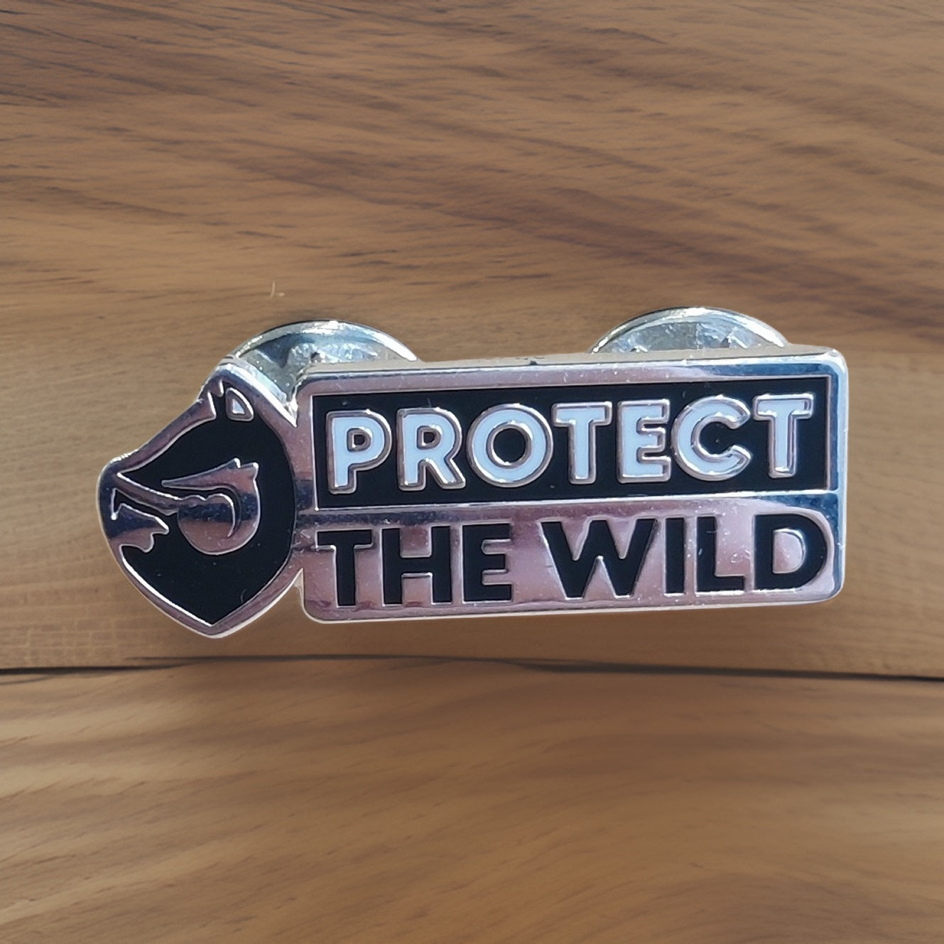 Protect the Wild pin badge