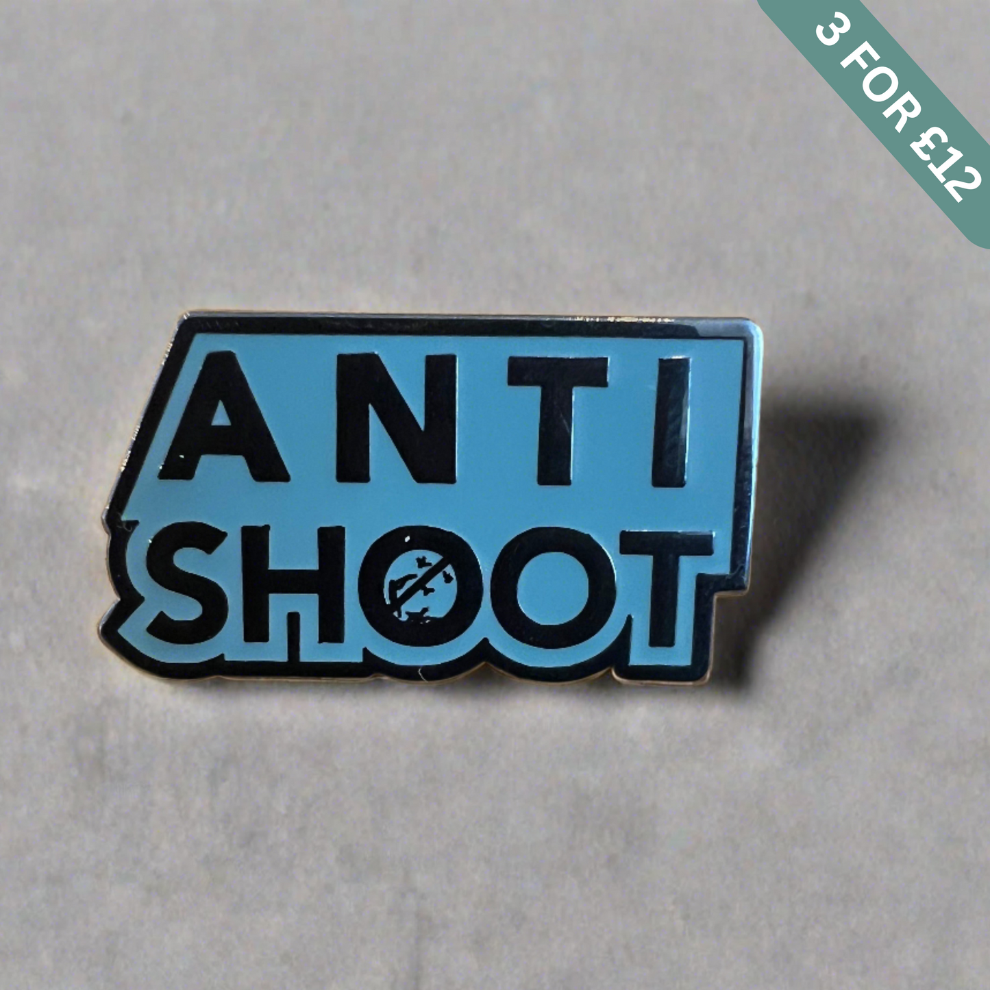 Anti Shoot Pin Badge